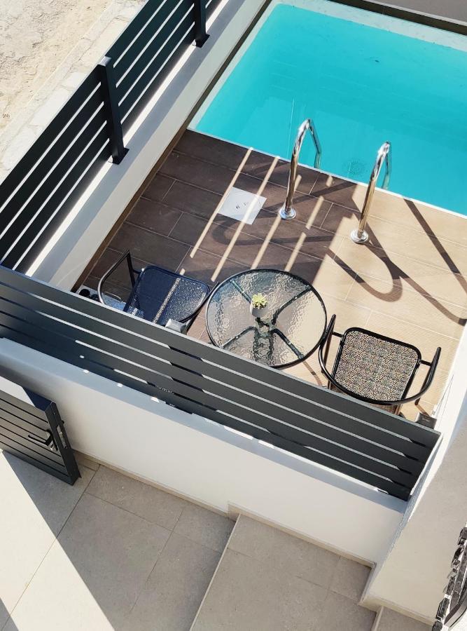 Aelia Seaside Luxury Suites Nea Karvali Extérieur photo