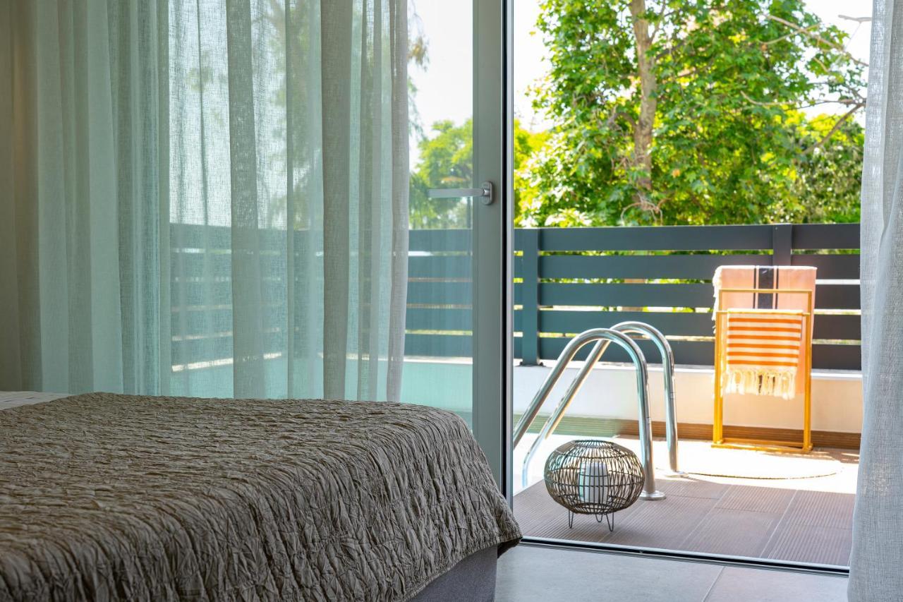 Aelia Seaside Luxury Suites Nea Karvali Extérieur photo