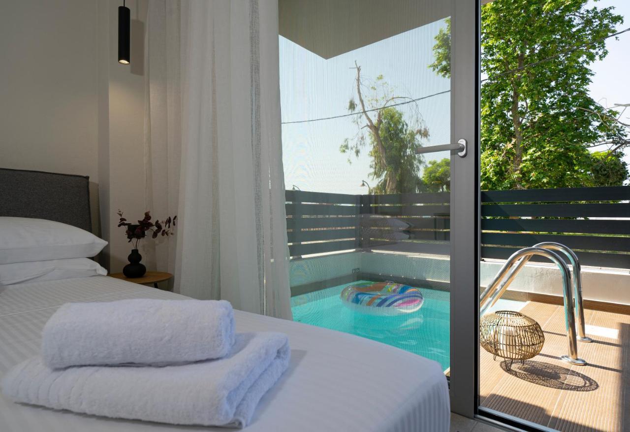 Aelia Seaside Luxury Suites Nea Karvali Extérieur photo